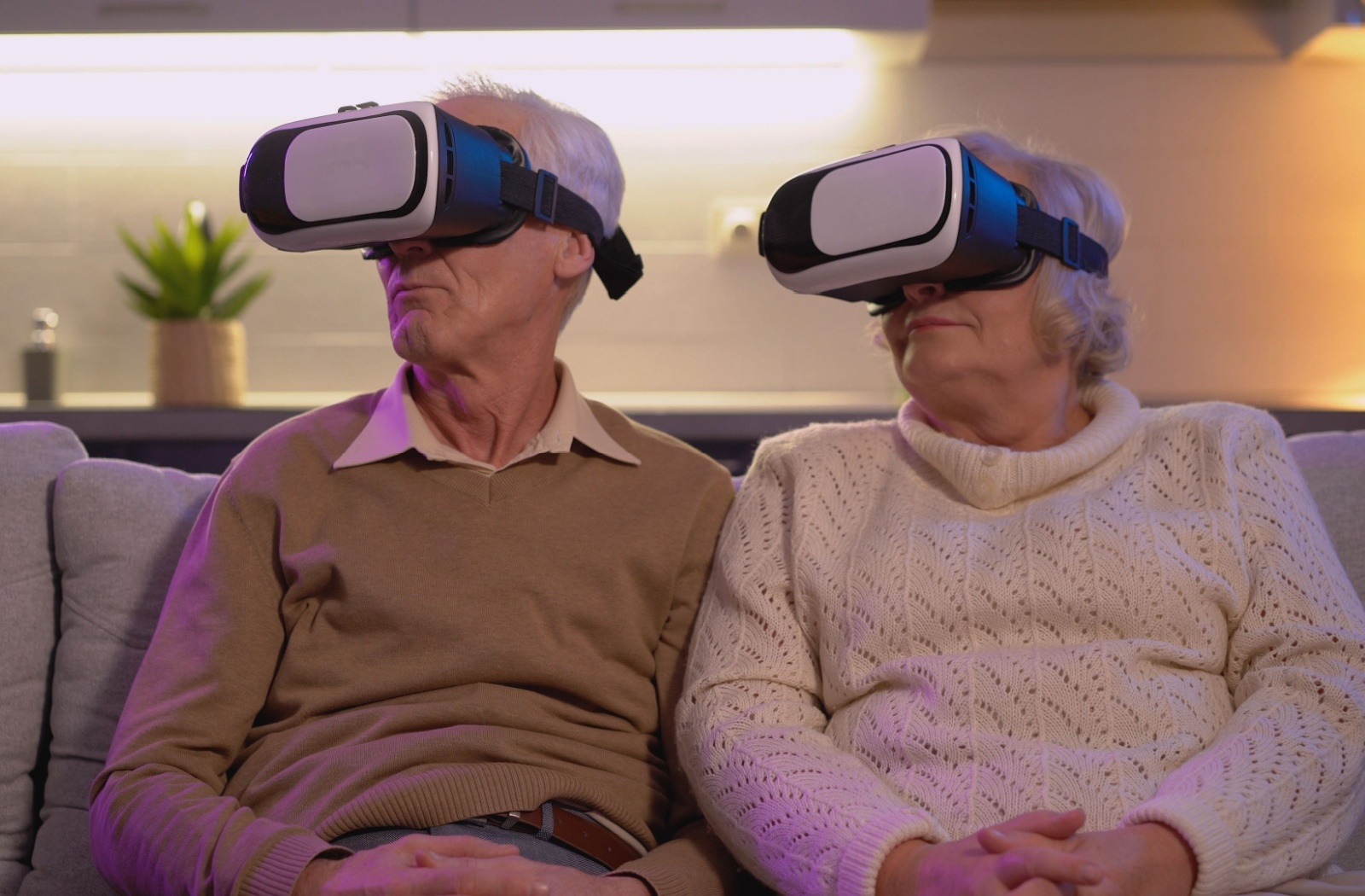 Mature couple tries out VR.
